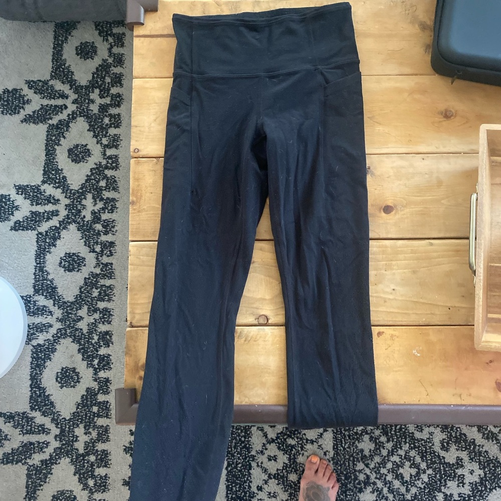 Athleta salutation stash tight
